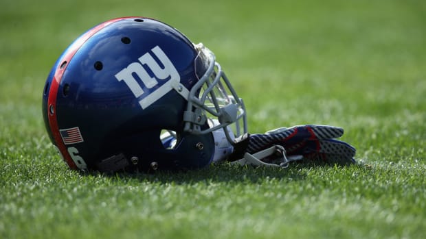 A picture of the New York Giants helmet on the field.