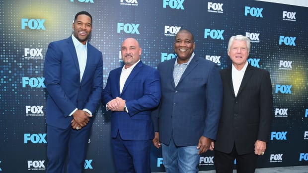 fox sports nfl analysts including Jay Glazer pose for a picture