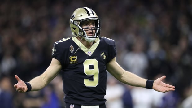 New Orleans Saints QB Drew Brees reacting during a game.