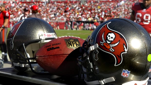 A closeup of two Tampa Bay Buccaneers helmets.