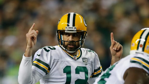 A closeup of Green Bay Packers QB Aaron Rodgers during a game.