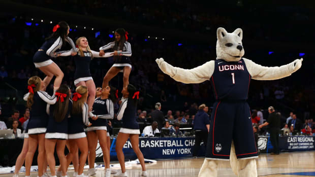 UConn's mascot and cheerleaders during a timeout.