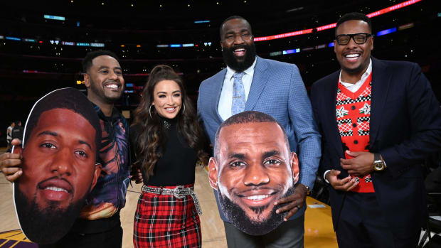 Kendrick Perkins on the court with his ESPN colleagues before an NBA game.