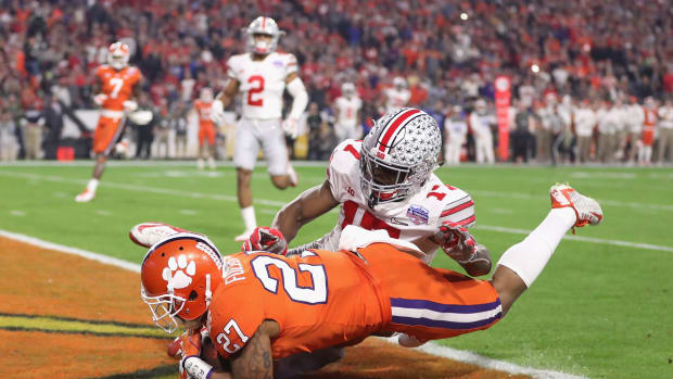 C.J. Fuller scores a touchdown for Clemson against Ohio State during a college football game.