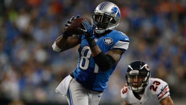 Calvin Johnson catching a pass for the Detroit Lions.