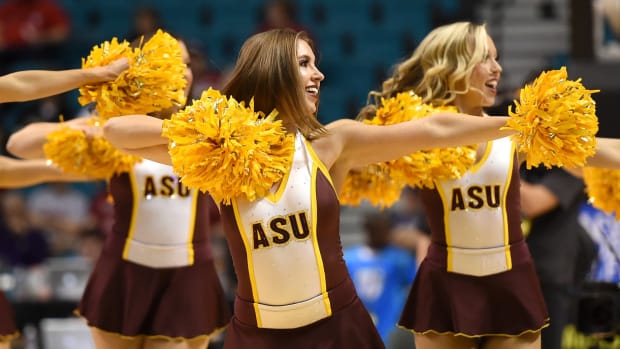 Arizona State Sun Devils cheerleaders perform during a first-round game of the Pac-12 Basketball Tournament against the USC Trojans at the MGM Grand Garden Arena.