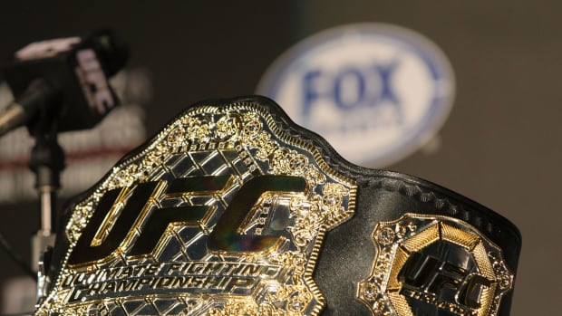 A picture of a gold UFC belt.