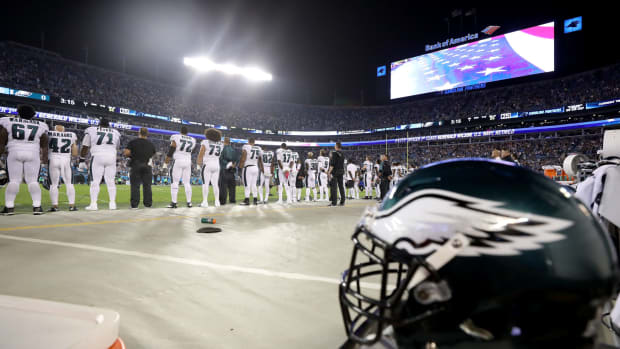 A closeup of a Philadelphia Eagles helmet on the sideline.