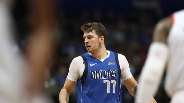 Luka Doncic looking around during a game.