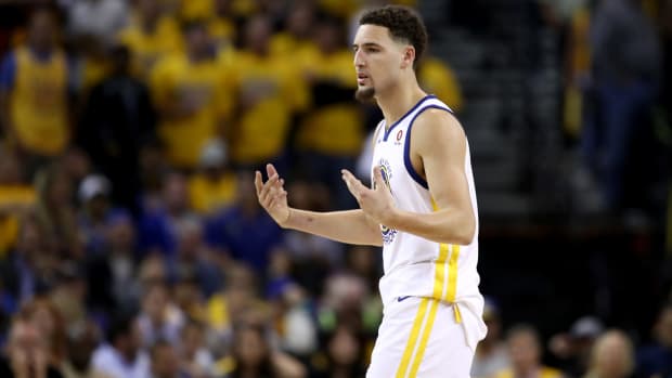 Klay Thompson reacting during a game.