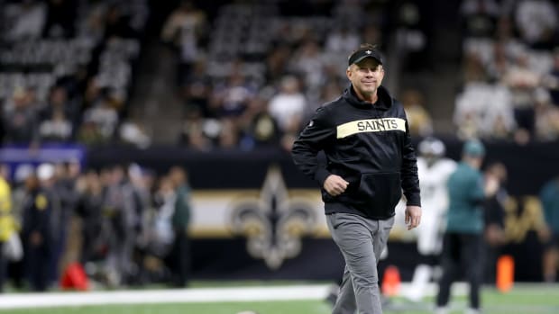 New Orleans Saints coach Sean Payton walking on the field during warmups.
