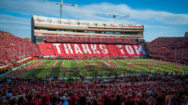 Nebraska football fans forming into a sign that says "thanks Tom" to Tom Osborne.