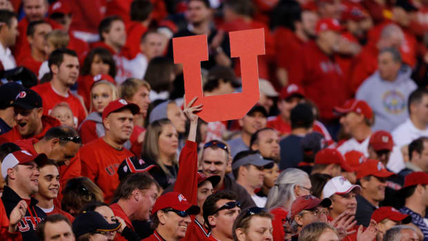 Utah fan holding up a giant U.