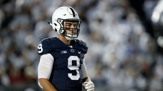 Trace McSorley looks on during a play.