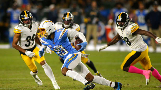 Keenan Allen runs the ball for the Los Angeles Chargers.