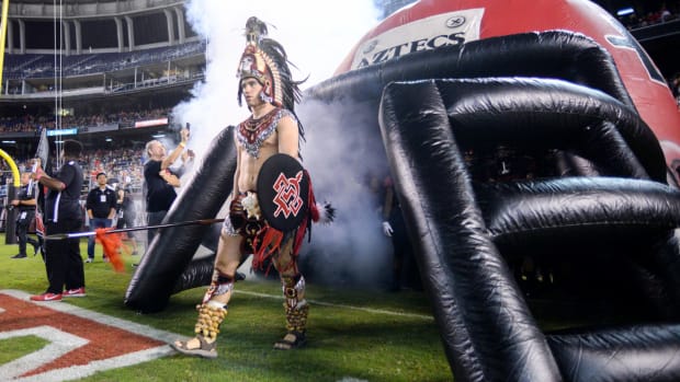 San Diego State's mascot leading the team onto the field.