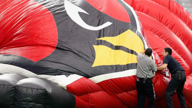 Arizona Cardinals inflatable helmet being taken down.