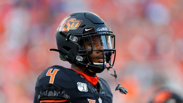 A.J. Green of the Oklahoma State Cowboys looks on.