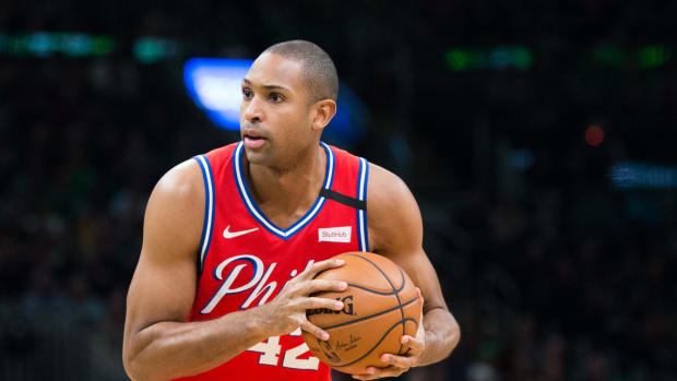 Al Horford holds the ball during a game with the Philadelphia 76ers.