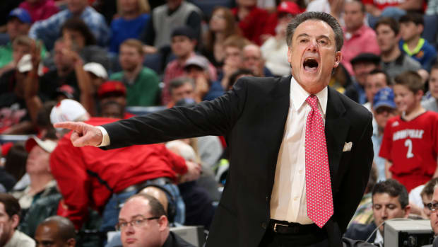 Rick Pitino roaming the sidelines during a Louisville game.