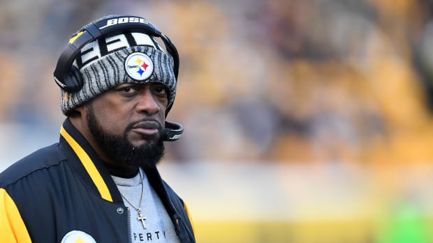 Mike Tomlin wearing a Steelers hat in Pittsburgh.