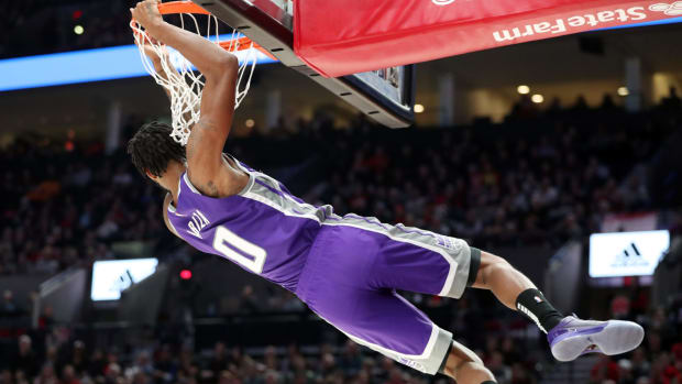 Sacramento Kings wing Trevor Ariza dunks against the Portland Trail Blazers during a game.