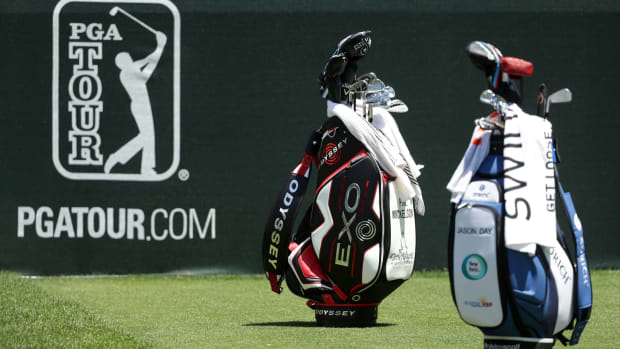 Two golf backs next to the PGA Tour logo.