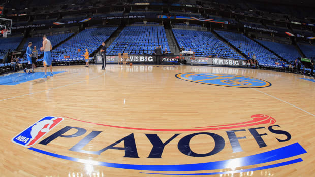 A view of the NBA Playoffs logo on the Denver Nuggets court.
