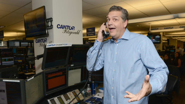 ESPN's Mike Golic answers a phone.