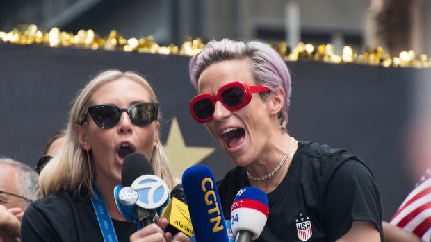 Allie Long and Megan Rapinoe celebrate the World Cup win.