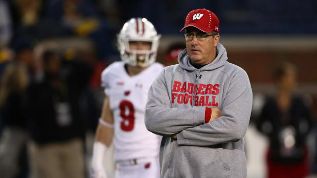 A closeup of Paul Chryst during a Wisconsin Badgers football game.