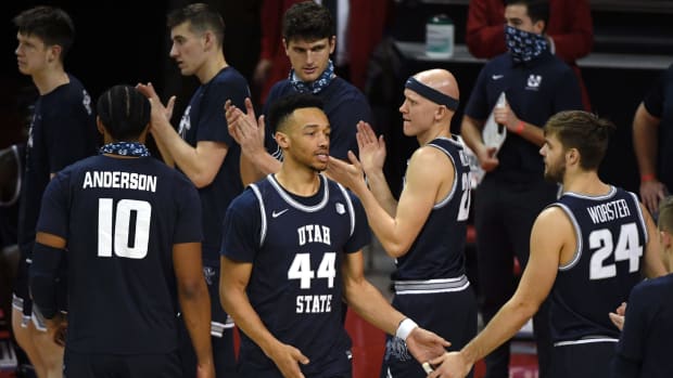 Marco Anthony and the Utah State basketball team during a game against UNLV.