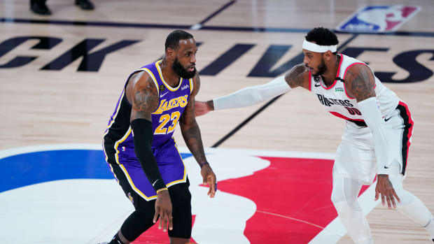 LeBron James and Carmelo Anthony in Game 3 of the Lakers-Blazers NBA Playoffs series.