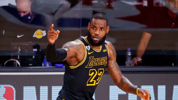 LeBron James in the Los Angeles Lakers Black Mamba alternate uniforms during an NBA FInals game against the Miami Heat.
