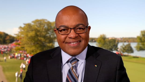 A closeup of Mike Tirico at the Ryder Cup.