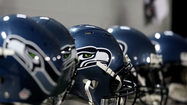 Seattle Seahawks helmets on the sideline.