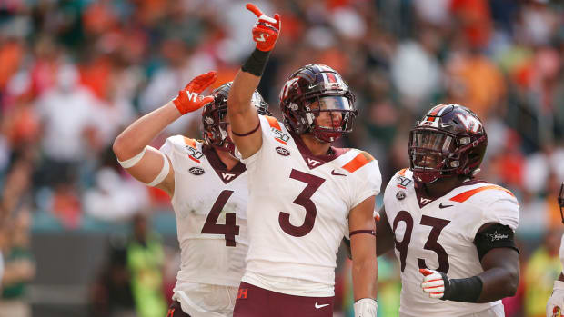 Virginia Tech star Caleb Farley, a top college football NFL Draft prospect, celebrates a play vs. Miami.