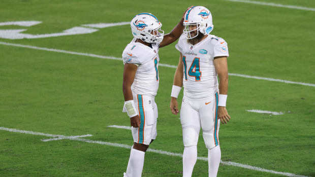 Miami Dolphins quarterbacks Tua Tagovailoa and Ryan Fitzpatrick.