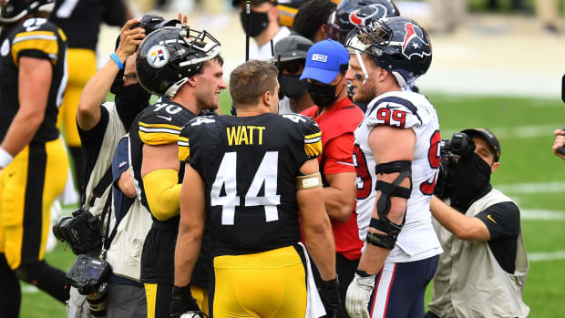 JJ Watt and Derek Watt talking after a Houston Texans vs. Pittsburgh Steelers game.