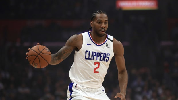 Kawhi Leonard dribbles the ball for the Los Angeles Clippers.