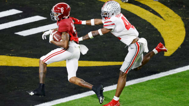 Alabama football star DeVonta Smith scores against Ohio State in the national title game.