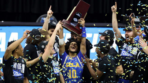 UCLA players celebrate beating Michigan and making the Final Four.