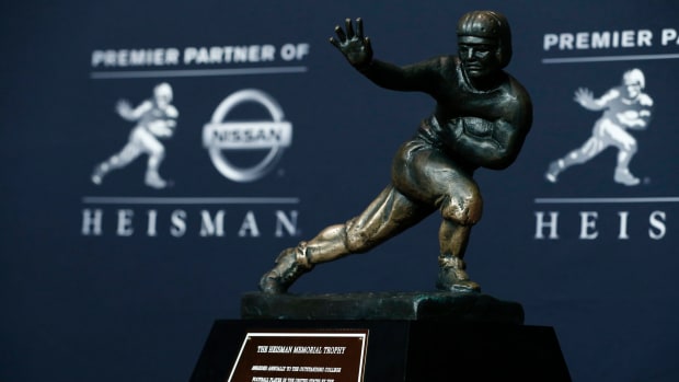 The Heisman Trophy sitting on a podium ahead of the award's 2017 announcement