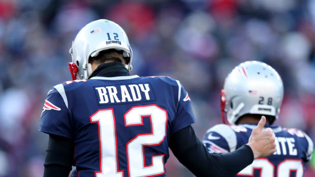New England Patriots quarterback Tom Brady and James White.