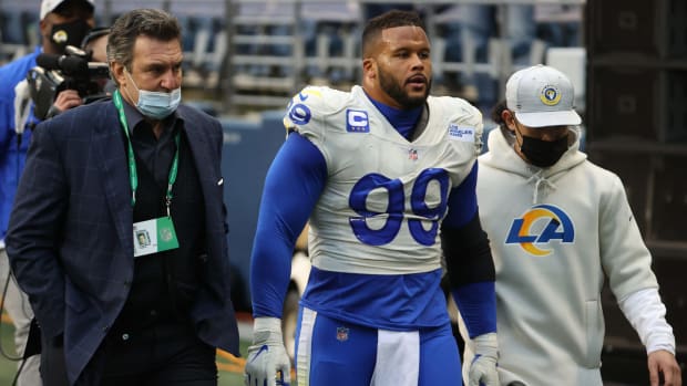 Aaron Donald attended to by medical personnel.