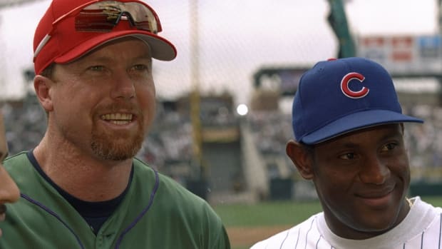 Mark McGwire posing for a photo with Sammy Sosa.