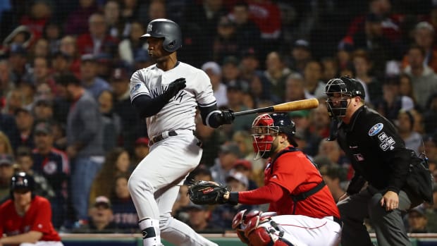 Andrew McCutchen hitting for the New York Yankees against the Boston Red Sox.