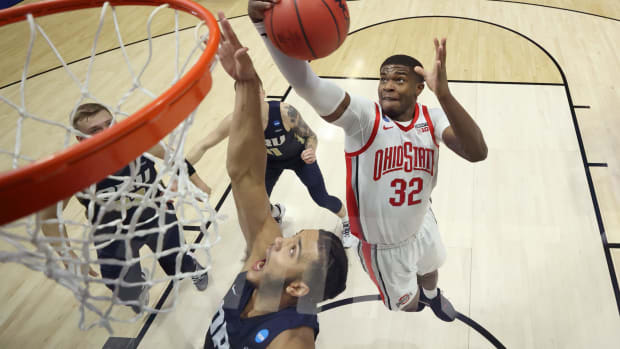 E.J. Liddell of Ohio State drives to the hoop.