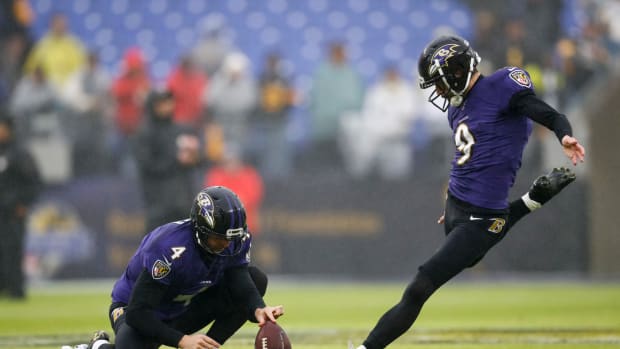 Justin Tucker attempts a field goal for the Baltimore Ravens.