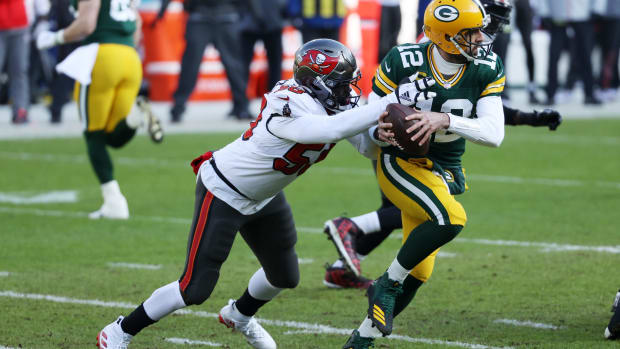 Tampa Bay Buccaneers star Shaquil Barrett tackling Green Bay's Aaron Rodgers in the NFC Championship game.